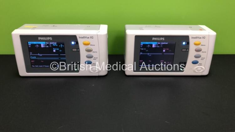 2 x Philips IntelliVue X2 Handheld Patient Monitors S/W Rev K.21.42 / K.21.42 with Press/Temp, NBP, SpO2 and ECG/Resp Options with 2 x Batteries (Both Power Up) *Mfd 2011 - 2011* *SN-DE03776851 - DE03776835*