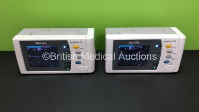 2 x Philips IntelliVue X2 Handheld Patient Monitors S/W Rev K.21.42 / K.21.42 with Press/Temp, NBP, SpO2 and ECG/Resp Options with 2 x Batteries (Both Power Up) *Mfd 2009 - NA* *SN-DE83629198 - DE03776841*