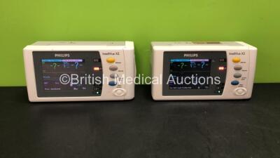 2 x Philips IntelliVue X2 Handheld Patient Monitors Software Version K.21.58 - K.21.61 Including ECG, SpO2, NBP, Temp and Press Options with 2 x Philips M4607A Batteries *Mfd 07-2010, 07-2010* (Both Power Up)