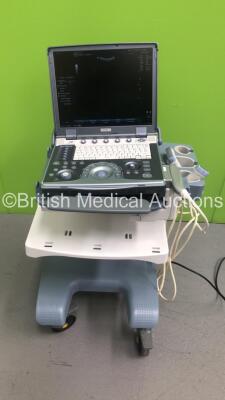 GE Logiq e Portable Ultrasound Scanner Ref 5148751 *S/N 57454WX1* **Mfd 04/2007** Software Version R4.0.4 with 2 x Transducers / Probes (4C-RS Ref 5125386 *Mfd 07/2016* and 12L-RS Ref 5141337 *Mfd 01/2013* on Voluson Dock Cart (Powers Up - Docking Cart No