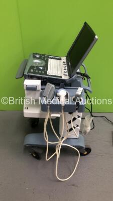 GE Logiq e Portable Ultrasound Scanner Ref 5148751 *S/N 57454WX1* **Mfd 04/2007** Software Version R4.0.4 with 2 x Transducers / Probes (4C-RS Ref 5125386 *Mfd 07/2016* and 12L-RS Ref 5141337 *Mfd 01/2013* on Voluson Dock Cart (Powers Up - Docking Cart No - 14