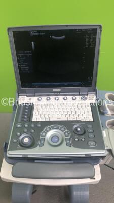 GE Logiq e Portable Ultrasound Scanner Ref 5148751 *S/N 57454WX1* **Mfd 04/2007** Software Version R4.0.4 with 2 x Transducers / Probes (4C-RS Ref 5125386 *Mfd 07/2016* and 12L-RS Ref 5141337 *Mfd 01/2013* on Voluson Dock Cart (Powers Up - Docking Cart No - 20