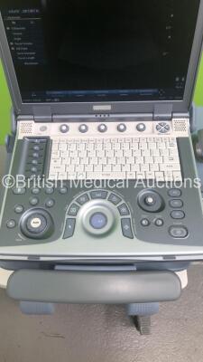 GE Logiq e Portable Ultrasound Scanner Ref 5148751 *S/N 57454WX1* **Mfd 04/2007** Software Version R4.0.4 with 2 x Transducers / Probes (4C-RS Ref 5125386 *Mfd 07/2016* and 12L-RS Ref 5141337 *Mfd 01/2013* on Voluson Dock Cart (Powers Up - Docking Cart No - 21