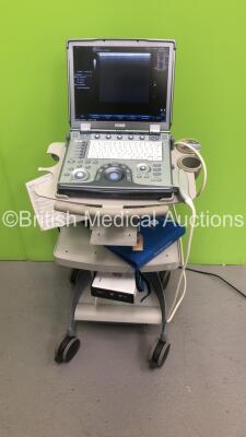 GE Logiq e Portable Ultrasound Scanner Ref 5322678 *S/N 141073WX7* **Mfd 03/2010** Software Version R5.2.2 with 1 x Transducer / Probe (12L-RS Ref 5141337 *Mfd 11/2015**) on GE Mobile Cart (Powers Up)