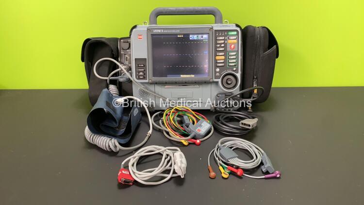 Medtronic Physio-Control Lifepak 15 Version 2 12-Lead Monitor / Defibrillator *Mfd - 2012* Ref - 99577-000656 P/N - V15-2-001003 Software Version - 3306808-005 with Pacer, CO2, SPO2, NIBP, ECG, Auxiliary Power and Printer Options, 4 and 6 Lead ECG Leads,