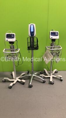 2 x Welch Allyn ProPaq LT Patient Monitors on Stands with 2 x BP Hoses,1 x SpO2 Finger Sensor and 1 x ECG Lead and 1 x Welch Allyn Spot Vital Signs Monitor on Stand (All Power Up-1 x Broken Bracket-See Photos)