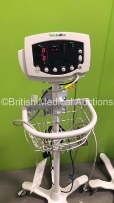 4 x Welch Allyn 53N00 Patient Monitors on Stands with 4 x BP Hoses,3 x SpO2 Finger Sensors and 1 x BP Cuff (All Power Up) - 5