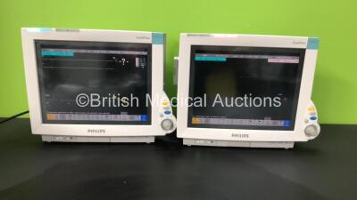 2 x Philips IntelliVue MP70 Patient Monitors *Mfd - 2010* with 2 x Philips M3001A Opt: A01C06C12 Multiparameter Modules with Press, Temp, NBP, SPO2 and ECG Resp Options (Both Power Up with Damaged Casing - See Photo)