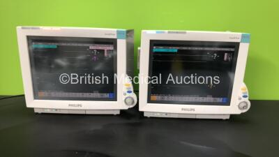 2 x Philips IntelliVue MP70 Patient Monitors *Mfd - 2010* with 2 x Philips M3001A Opt: A01C18 Multiparameter Modules with Press, Temp, NBP, SPO2 and ECG Resp Options (Both Power Up, 1 with Scratched Screen, 1 Missing Dial - See Photos)