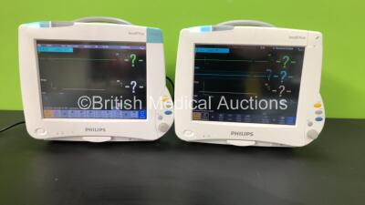 2 x Philips IntelliVue MP50 Patient Monitors *Mfd's - 2014 and 2008* with 1 x Philips M3001A Opt: A01C06C12 Multiparameter Module with Press, Temp, NBP, SPO2 and ECG Resp Options and 1 x Philips M3001A Opt: A01 Multiparameter Module with NBP, SPO2 and EC