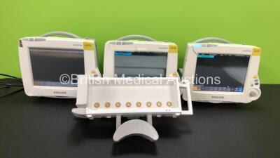 3 x Philips IntelliVue MP30 Patient Monitors *Mfds - 2 x 2011 and 1 x 2009* (All Power Up with Damaged Casing - See Photos) with 1 x Philips Module Rack