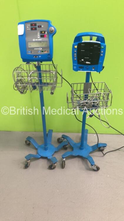 1 x GE ProCare Patient Monitor on Stand with 1 x SpO2 Finger Sensor and 1 x GE Dinamap Pro 300V2 Patient Monitor on Stand with 1 x SpO2 Finger Sensor (1 x Powers Up,1 x No Power) * SN AAX0618000SA / 2019194 *