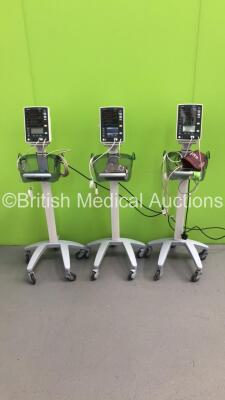 3 x Mindray Datascope Accutorr V Patient Monitors on Stands with 3 x BP Hoses,3 x BP Cuffs and 3 x SpO2 Finger Sensors (All Power Up)