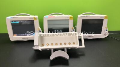 3 x Philips Intellivue MP30 Patient Monitors with 1 x Philips M8048A Module Rack (All Power Up with Damage-See Photos) *Mfd 2011 - 2014*