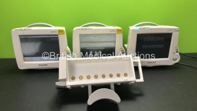 3 x Philips Intellivue MP30 Patient Monitors with 1 x Philips M8048A Module Rack (All Power Up with Damage-See Photos) *Mfd 2011 - 2012*