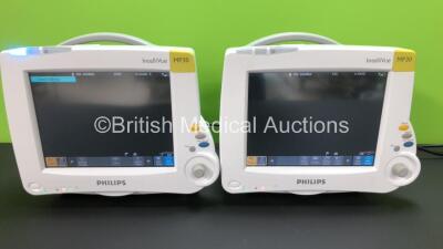 2 x Philips Intellivue MP30 Touch Screen Patient Monitors Version M.04.05-19 / M.04.05-19 (Both Power Up) *Mfd 2009 / 2009* **DE72870326 - DE72871544**