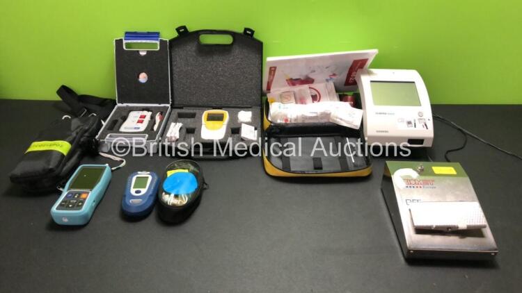 Mixed Lot Including 1 x Roche Accutrend Plus GCTL Meter in Case (Powers Up) 1 x Microstim DB8 Supramaximal Nerve Stimulator in Case (Powers Up) 1 x Siemens Clinitek Status Analyzer Unit with 1 x AC Power Supply (Powers Up) 1 x BioMet Footswitch and 1 x EZ