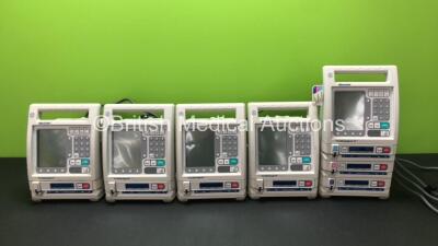 Job Lot of Pumps Including 4 x Baxter Colleague Infusion Pumps (All Power Up) 1 x Baxter Colleague 3 Infusion Pump (Powers Up with Blank Screen)
