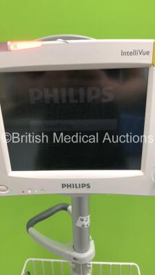 Philips IntelliVue MP30 Patient Monitor on Stand with 1 x Philips M3001A Module with ECG/Resp,SpO2,NBP and Press/Temp Options * Mfd 2005 * and Leads (Powers Up-Slight Crack to Casing-See Photos) * Mfd 2006 * - 2