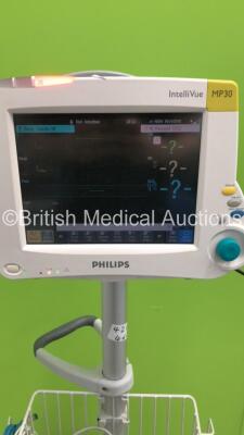 Philips IntelliVue MP30 Patient Monitor on Stand with 1 x Philips M3001A Module with ECG/Resp,SpO2,NBP and Press/Temp Options * Mfd 2005 * and Leads (Powers Up-Slight Crack to Casing-See Photos) * Mfd 2006 * - 3