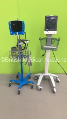 1 x Mindray VS-900 Patient Monitor on Stand and 1 x GE Carescape V100 Patient Monitor on Stand with 1 x BP Hose (Both Power Up) * SN FV-67011808 / SDT10500161SA *