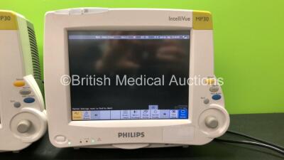 3 x Philips IntelliVue MP30 Patient Monitors (All Power Up with Cracked Casing-See Photos) *Mfd's 2008 - 2013 - 2005* - 2