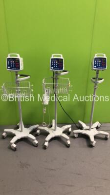 3 x Criticare Comfort Cuff 506N3 Series Patient Monitors on Stands (All Power Up)