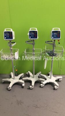 3 x Criticare Comfort Cuff 506N3 Series Patient Monitors on Stands (All Power Up-1 x Missing Casing-See Photos)