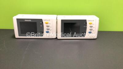 2 x Philips IntelliVue X2 Patient Monitors with Press, Temp, NBP, SPO2 and ECG RESP Options and 2 x Flat Batteries (Both Power Up with Stock Batteries, 2 x Flat Batteries Included)