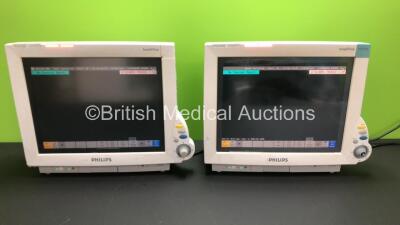 2 x Philips IntelliVue MP70 Touch Screen Patient Monitors Software Version D.00.58 - C.00.90 *Mfd 2005 - 2006* (Both Power Up with Missing Dial - See Photo) *DE61749426 - DE52035761*