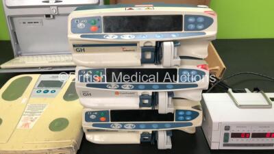 Mixed Lot Including 1 x Volumed VP 7000 Volumetric Pump (Powers Up) 2 x Carefusion Alaris GH Syringe Pumps (Both Power Up with Blank Screens and Alarms) 1 x Alaris Asena GH Syringe Pump (Powers Up with Blank Screen and Alarm) 1 xRDP 104222 Display Screen - 3