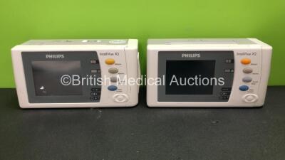 2 x Philips Intellivue X2 Handheld Patient Monitors Software Version K.21.61 - M.04.00 Including ECG, SpO2, NBP, Temp and Press Options with 2 x Batteries (Both Power Up when Tested with Stock Batteries,2 x Flat Batteries Included, 1 with Cracked Casing-S