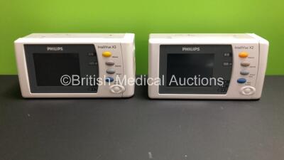 2 x Philips IntelliVue X2 Handheld Patient Monitors S/W Rev K.21.61 / H.03.14 with Press/Temp, NBP, SpO2 and ECG/Resp Options with 2 x Batteries (Both Power Up with Stock Batteries,2 x Flat Batteries Included) *Mfd 20010 / 2010*