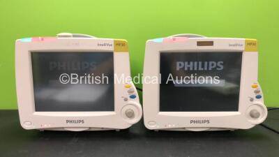 2 x Philips Intellivue MP30 Patient Monitors with 2 x Philips M3001A Modules Including ECG, SpO2 and NBP Options (Both Power Up)