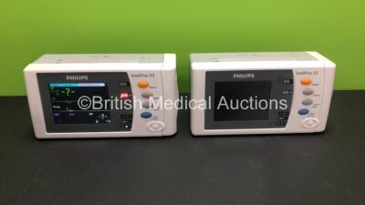 2 x Philips IntelliVue X2 Handheld Patient Monitors S/W Rev M.04.00 / M.04.00 with Press/Temp, NBP, SpO2 and ECG/Resp Options with 2 x Batteries (Both Power Up with Stock Batteries,2 x Flat Batteries Included) *Mfd 2018 / 2018*