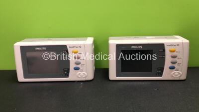 2 x Philips Intellivue X2 Handheld Patient Monitors Software Version K.21.61 - K.21.61 Including ECG, SpO2, NBP, Temp and Press Options with 2 x Batteries (Both Power Up when Tested with Stock Batteries,2 x Flat Batteries Included-Damaged-See Photos) *Mfd