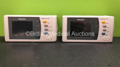 2 x Philips Intellivue X2 Handheld Patient Monitors Software Version Including K.21.61 - K.21.61 ECG, SpO2, NBP, Temp and Press Options with 2 x Batteries (Both Power Up when Tested with Stock Batteries,2 x Flat Batteries Included) *Mfd 2010 - 2010*