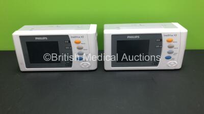 2 x Philips IntelliVue X2 Handheld Patient Monitors S/W Rev M.04.00 / M.04.00 with Press/Temp, NBP, SpO2 and ECG/Resp Options with 2 x Batteries (Both Power Up with Stock Battery,2 x Flat Batteries Included) *Mfd 2018 / 2018*