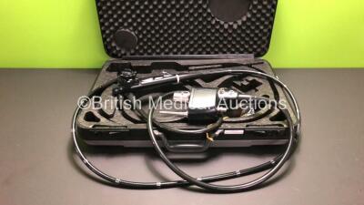 Pentax EC34-i10F Colonoscope in Carry Case. Engineers Report : Optical System - Unable to Check, Angulation - Not Reaching Specification, To be Adjusted, Insertion Tube - Worn, Light Transmission - Ok, Channels - Unable to Check, Leak Check - Unable to Ch