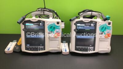 2 x Philips MRx Defibrillators Including 2 x Pacer, 2 x ECG, 1 x SpO2, 1 x BP and 2 x Printer Options with 1 x Laerdal CPR Meter, 2 x Philips M3538A Batteries, 2 x Philips M3539A Modules, 2 x Paddle Leads and 2 x Philips M3725A Test Loads (Both Power Up)