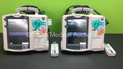 2 x Philips MRx Defibrillators Including 2 x Pacer, 2 x ECG, 1 x SpO2, 1 x BP and 2 x Printer Options with, 2 x Philips M3538A Batteries, 2 x Philips M3539A Modules, 2 x Paddle Leads and 2 x Philips M3725A Test Loads (Both Power Up)