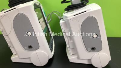 2 x Philips Heartstart MRx Defibrillators Including ECG and Printer Options with 2 x Paddle Leads and 2 x Philips M3725A Test Loads 2 x M3539A Modules and 2 x Philips M3538A Batteries *Mfd 2011 - 2008* (Both Power Up) - 2