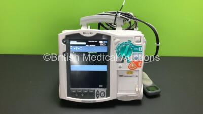 Philips MRx Defibrillator Including Pacer, ECG and Printer Options with 1 x Laerdal CPR Meter, 1 x Philips M3538A Battery, 1 x Philips M3539A Module, 1 x Paddle Leads and 1x Philips M3725A Test Load *Mfd 2015* (Powers Up) *US00589711* (H)