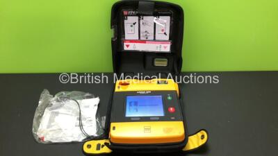 Physio-Control/Medtronic Lifepak 1000 Defibrillator Version 2.51 with Carry Case, Battery and Electrodes *Mfd 2016* (Powers Up) *44573309*