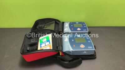 2 x Philips Heartstart FR2+ Defibrillators with 2 x Philips M3863A Batteries *Install Dates 12-2022, 05-2022* (Both Power Up)