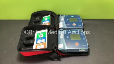 2 x Philips Heartstart FR2+ Defibrillators with 2 x Philips M3863A Batteries *Install Dates 02-2022, 04-2022* (Both Power Up)