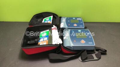 2 x Philips Heartstart FR2+ Defibrillators with 2 x Philips M3863A Batteries *Install Dates 09-2023, 09-2023* (Both Power Up)