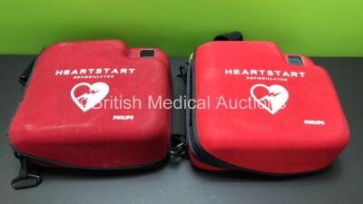 2 x Philips Heartstart FR2+ Defibrillators with 2 x Philips M3863A Batteries *Install Dates 04-2023, 09-2022* and Carry Cases (Both Power Up and Pass Self Test) - 5