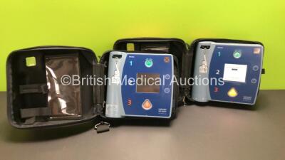 2 x Philips Heartstart FR2+ Defibrillators with 2 x Philips M3863A Batteries *Install Dates 09-202, 12-2022* and Carry Cases (Both Power Up and Pass Self Test)