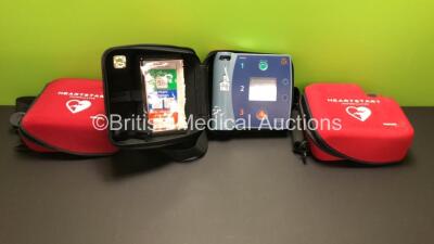 Philips Heartstart FR2+ Defibrillator with 1 x Philips M3863A Battery and Carry Case *Install Date 09-2023* (Powers Up and Passes Self Test) with 2 x Empty Philips FR2+ Carry Cases